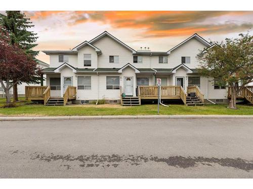 29 Sandpiper Link Nw, Calgary, AB - Outdoor With Deck Patio Veranda With Facade