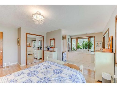 178125 240 Street West, Rural Foothills County, AB - Indoor Photo Showing Bedroom