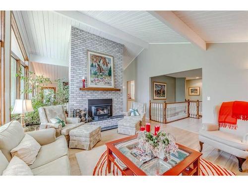 178125 240 Street West, Rural Foothills County, AB - Indoor Photo Showing Living Room With Fireplace