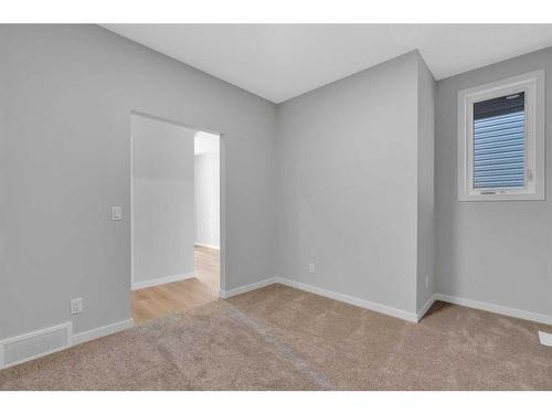 42 Savoy Landing Se, Calgary, AB - Indoor Photo Showing Other Room