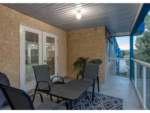 132-7229 Sierra Morena Boulevard Sw, Calgary, AB - Outdoor With Deck Patio Veranda With Exterior