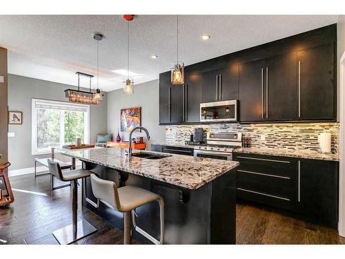 45 Westmore Place Sw, Calgary, AB - Indoor Photo Showing Kitchen With Upgraded Kitchen