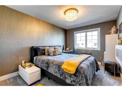 45 Westmore Place Sw, Calgary, AB - Indoor Photo Showing Bedroom