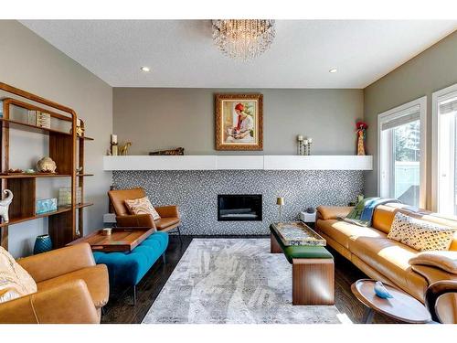 45 Westmore Place Sw, Calgary, AB - Indoor Photo Showing Living Room With Fireplace