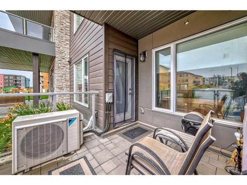 112-150 Shawnee Square Sw, Calgary, AB - Outdoor With Deck Patio Veranda With Exterior