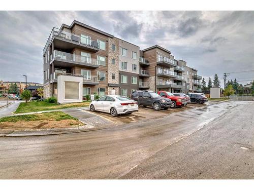 112-150 Shawnee Square Sw, Calgary, AB - Outdoor With Facade