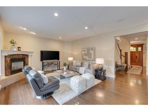 1221 20 Street Nw, Calgary, AB - Indoor Photo Showing Living Room With Fireplace