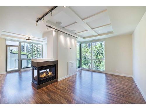 304-701 3 Avenue Sw, Calgary, AB - Indoor With Fireplace