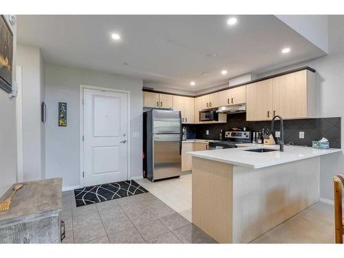 308-3651 Marda Link Sw, Calgary, AB - Indoor Photo Showing Kitchen With Stainless Steel Kitchen