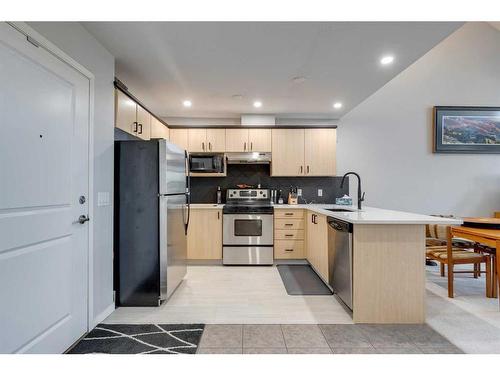 308-3651 Marda Link Sw, Calgary, AB - Indoor Photo Showing Kitchen With Stainless Steel Kitchen