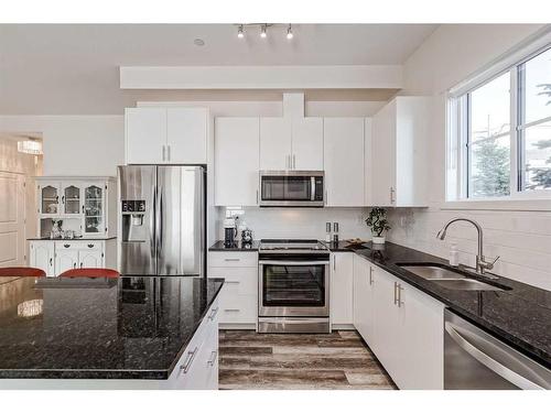 4013-15 Sage Meadows Landing Nw, Calgary, AB - Indoor Photo Showing Kitchen With Double Sink With Upgraded Kitchen