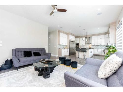 162 Kinniburgh Crescent, Chestermere, AB - Indoor Photo Showing Living Room