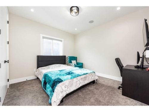 162 Kinniburgh Crescent, Chestermere, AB - Indoor Photo Showing Bedroom