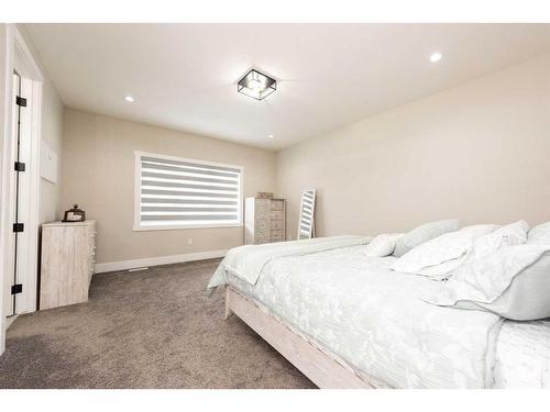 162 Kinniburgh Crescent, Chestermere, AB - Indoor Photo Showing Bedroom