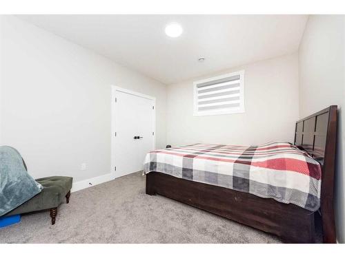 162 Kinniburgh Crescent, Chestermere, AB - Indoor Photo Showing Bedroom