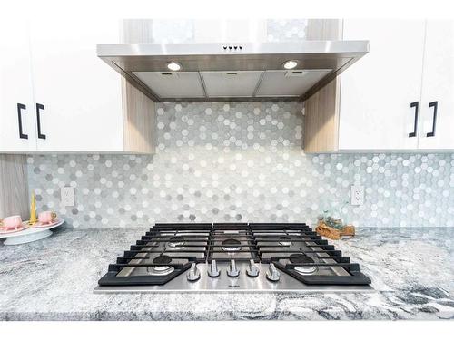 162 Kinniburgh Crescent, Chestermere, AB - Indoor Photo Showing Kitchen