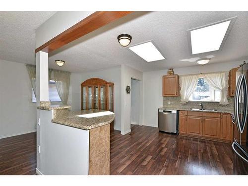 1047 Rundleside Drive Ne, Calgary, AB - Indoor Photo Showing Kitchen With Stainless Steel Kitchen With Double Sink