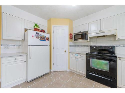 63 Saddlemont Way Ne, Calgary, AB - Indoor Photo Showing Kitchen