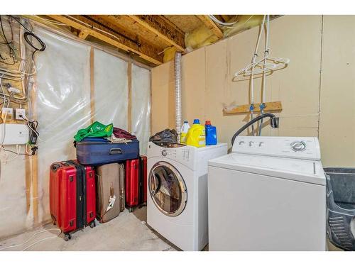 63 Saddlemont Way Ne, Calgary, AB - Indoor Photo Showing Laundry Room