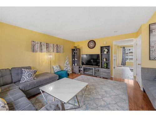 63 Saddlemont Way Ne, Calgary, AB - Indoor Photo Showing Living Room