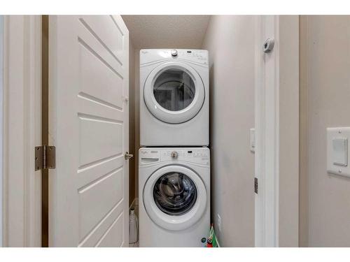 41 Legacy Glen Row Se, Calgary, AB - Indoor Photo Showing Laundry Room