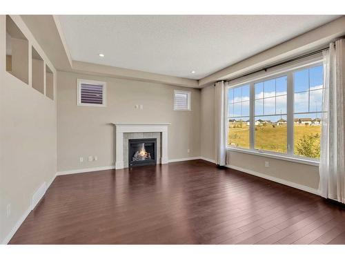 223 Cityscape Gardens Ne, Calgary, AB - Indoor Photo Showing Other Room With Fireplace