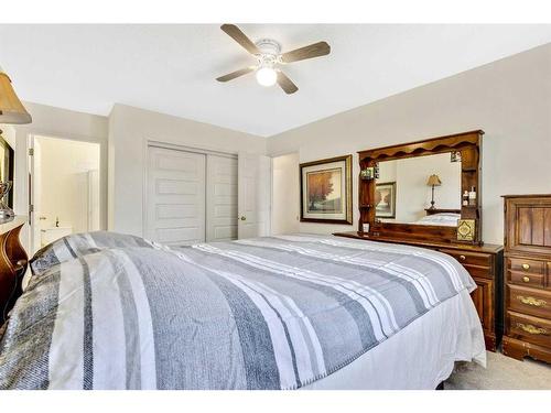 228 Willowbrook Close Nw, Airdrie, AB - Indoor Photo Showing Bedroom