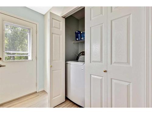 228 Willowbrook Close Nw, Airdrie, AB - Indoor Photo Showing Laundry Room