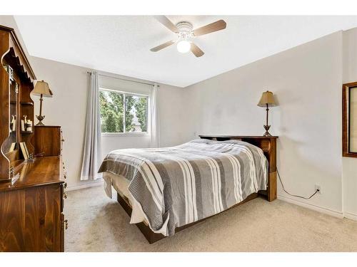 228 Willowbrook Close Nw, Airdrie, AB - Indoor Photo Showing Bedroom