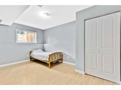 228 Willowbrook Close Nw, Airdrie, AB - Indoor Photo Showing Bedroom