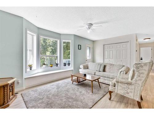 228 Willowbrook Close Nw, Airdrie, AB - Indoor Photo Showing Living Room