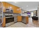 # 202-35 Richard Court Sw, Calgary, AB  - Indoor Photo Showing Kitchen With Stainless Steel Kitchen 