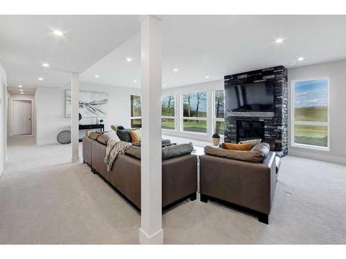 10-274172 112 Street West, Rural Foothills County, AB - Indoor Photo Showing Living Room With Fireplace