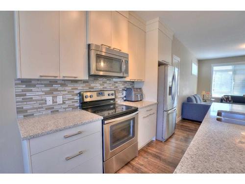 1617 Symons Valley Parkway Nw, Calgary, AB - Indoor Photo Showing Kitchen With Double Sink With Upgraded Kitchen