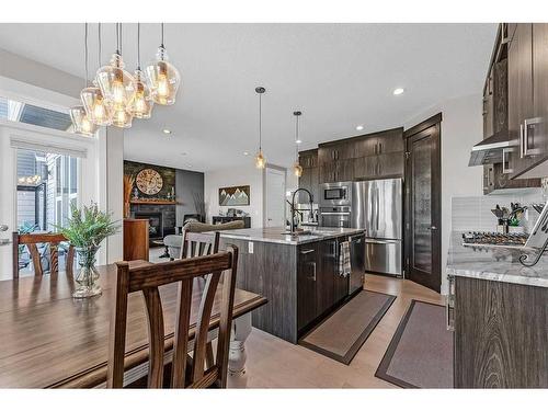 1461 Aldrich Place, Carstairs, AB - Indoor Photo Showing Kitchen With Stainless Steel Kitchen With Upgraded Kitchen