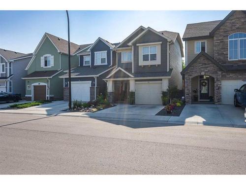 32 Cranbrook Green Se, Calgary, AB - Outdoor With Facade