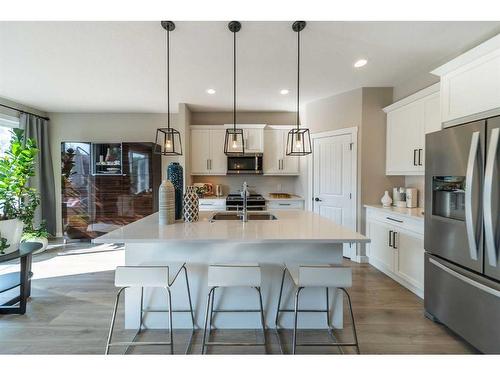 32 Cranbrook Green Se, Calgary, AB - Indoor Photo Showing Kitchen With Upgraded Kitchen