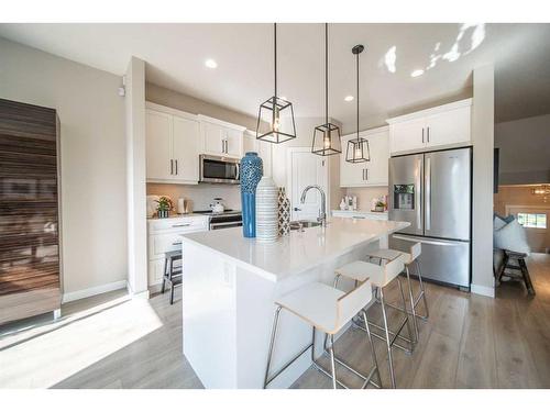 32 Cranbrook Green Se, Calgary, AB - Indoor Photo Showing Kitchen With Upgraded Kitchen