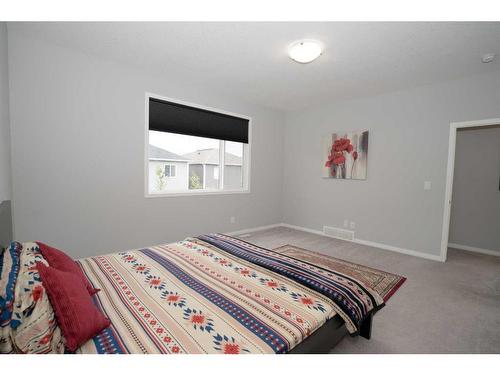 52 Yorkstone Grove Sw, Calgary, AB - Indoor Photo Showing Bedroom