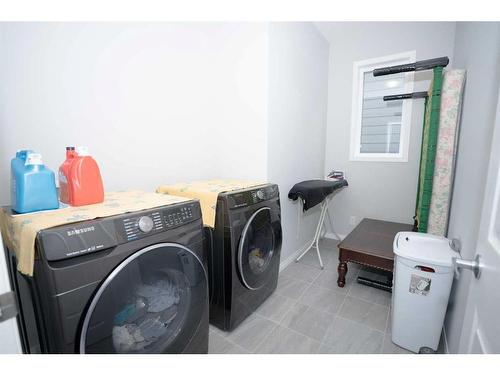 52 Yorkstone Grove Sw, Calgary, AB - Indoor Photo Showing Laundry Room