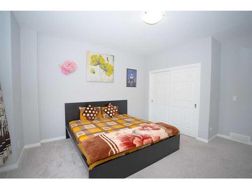 52 Yorkstone Grove Sw, Calgary, AB - Indoor Photo Showing Bedroom