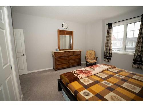 52 Yorkstone Grove Sw, Calgary, AB - Indoor Photo Showing Bedroom