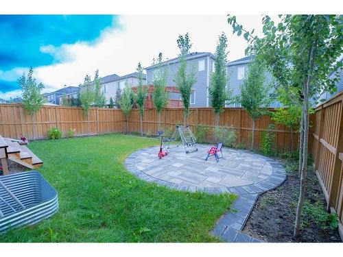 52 Yorkstone Grove Sw, Calgary, AB - Outdoor With Backyard