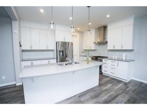 52 Yorkstone Grove Sw, Calgary, AB - Indoor Photo Showing Kitchen With Double Sink With Upgraded Kitchen