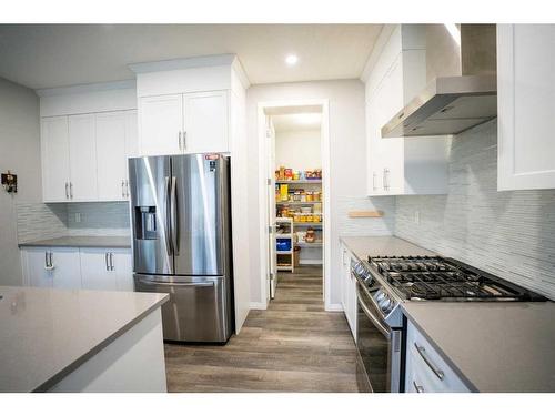 52 Yorkstone Grove Sw, Calgary, AB - Indoor Photo Showing Kitchen With Stainless Steel Kitchen With Upgraded Kitchen