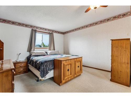 31 Tararidge Court Ne, Calgary, AB - Indoor Photo Showing Bedroom