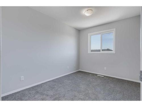 22 Bridleridge Road Sw, Calgary, AB - Indoor Photo Showing Other Room