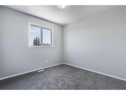 22 Bridleridge Road Sw, Calgary, AB - Indoor Photo Showing Other Room