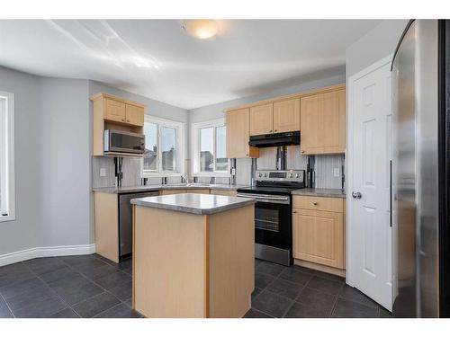 22 Bridleridge Road Sw, Calgary, AB - Indoor Photo Showing Kitchen