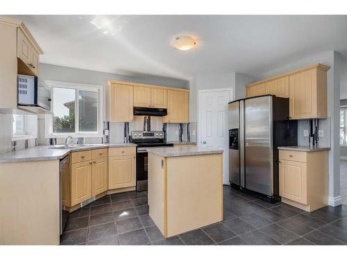 22 Bridleridge Road Sw, Calgary, AB - Indoor Photo Showing Kitchen